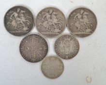 A collection of silver 19th century coins to include crowns, four shilling coins etc ( see