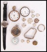 A collection of watches - wristwatch faces and movements to include silver cased pocket watches,