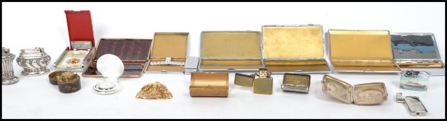 A good collection of vintage cigarette cases and lighters to include Ronson table lighters plated