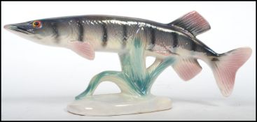 A stunning kitsch ceramic study of a fish by Jena Holland, the fish believed to be a pike raised
