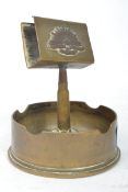 An early 20th century First World War WW1 trench art ash tray having a bullet surmounted with a