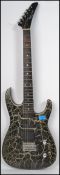 A vintage Phantom Master 3/4 size 6 string electric guitar having a lightning design body with