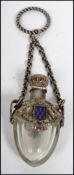 A continental silver white metal perfumer bottle / Holy water bottle on chain decorated with dragons