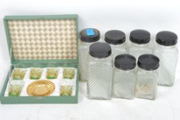 A collection of seven vintage 20th century Hygena kitchen storage jars, each with the Hygena logo