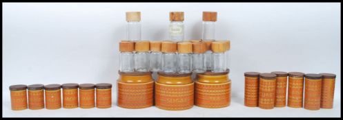 A collection of Hornsea retro 20th century storage jars with wooden lids and notation, all over