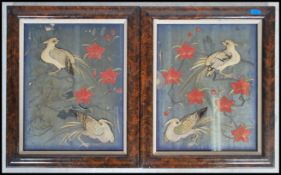 A pair of Oriental silk tapestry's depicting birds and flowers set in good tortoise shell type