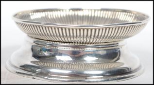 A hallmarked silver Victorian pin dish with ribbed decoration hallmarked for London 1886 by Thomas