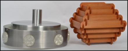 A vintage 20th century retro light fixture of ' UFO ' form having a polished steel band with clear