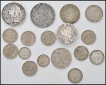 A good group of Victorian and other pre decimal silver coins to include an 1895 Queen Victoria