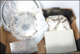 A good quality Viners silver plated table top cigarette case with articulated lid together with a