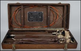 An early 20th century cased Brown Buerger Cystoscope, appears to be complete and bearing makers