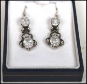 A lovely pair of vintage 925 sterling silver drop earrings set with four stones in a fine
