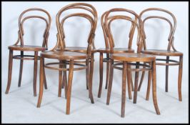 A set of 6 early 20th century bentwood cafe dining chairs in the Thonet manner.  Each with panel