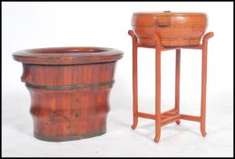 A vintage 20th century Chinese lacquered painted wash stand together with a painted lacquered baby