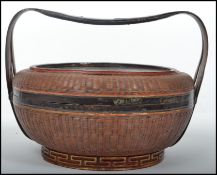 An early 20th Century Oriental Woven rice basket, cooking apparatus. Measurements: 14 cm high, 33 cm