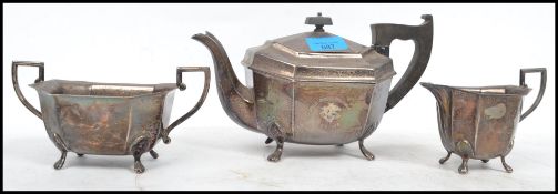 A three piece silver hallmarked tea service by Viners, to include a teapot, creamer and sugar