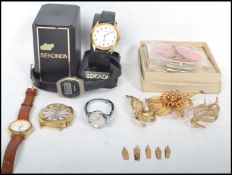 A collection of vintage costume jewellery to include a Monde lacking strap, boxed Sekonda etc,