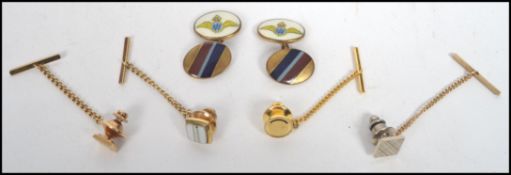 A group of three vintage and retro cufflinks to include a pair of RAF cufflinks, and others.
