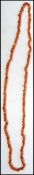 A vintage very long baroque amber necklace strand measuring approx 60 inches.