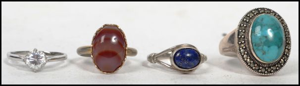 A group of sterling silver and other dress rings to include an marcasite example with