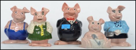 A collection / set of 20th century Wade Nat West Pigs ( see illustrations ). Measurements: 18 cm
