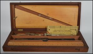 A late 19th century cased draughtsman's / mathematics set  containing different tools to include set