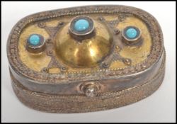 A vintage Kazakhstan silver gilt and Carnelian snuff box from Russian central Asia, fitted with a