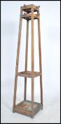 An early 20th century oak Arts and Crafts hall - stand. Measures 179cms by 40cms by 40cms.