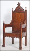 A fantastic 20th century carved oak hall / throne chair in the ecclesiastical style, with an