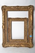 2 19th century gilt rococo plaster picture frames in the rococo style. One large and one small.