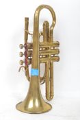 A vintage 20th century brass trumpet by Phil Parker ser no 109809.