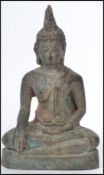 A 19th century hollow cast bronze Buddha moulded in the lotus position raised on a plinth base.