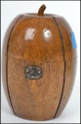 An 18th century style fruitwood tea caddy on the form of a melon with lock and key to front.