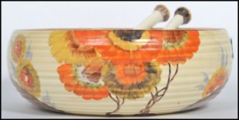 A vintage 20th century Clarice Cliff salad set decorated in the Rhodanthe pattern. The bowl having a