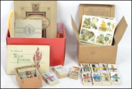 A collection of vintage 20th century cigarette cards to include mostly completed sets sorted and