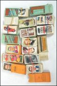 A collection of vintage cigarette cards to include Railway, Boxing Personalities, Dogs, The Reign of