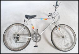 A retro 1980's Childs mountain bicycle  by Peuguot having 24