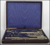 A 20th century vintage mahogany cased draughtsmans set having hinged centre with appointed