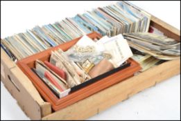 Hundreds of postcards in wooden crate, some Post Office issues noted, together with old photos,