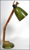 A good mid century Terence Conran Mac Lamp in green colourway with circular base and bell pendant