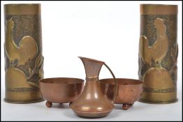 A pair of 20th century WW2 trench art vases depicting cockerels / roosters along with a pair of
