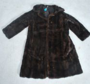 A vintage mid century mink fur coat by Richard Payne with label to the interior. Approx a size 8.