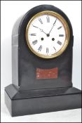 A Good Victorian large Slate mantel clock of spire shape. The large ceramic white dial with notation