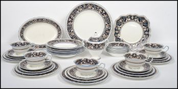 A 20th century Wedgwood Florentine part tea and dinner service service decorated in a cobalt