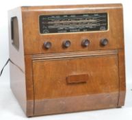 A vintage mid 20th century large wooden cased Columbia radio and record player having dials to front