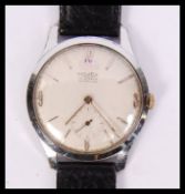 A vintage Majex 15 jewel vitaflex gents mid century wristwatch having stainless case with black