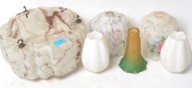 A collection of vintage 20th century light shades to include a stepped hexagonal art deco example,