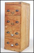 A good early 20th century upright Industrial panel wood 4 drawer filing cabinet. Of upright form