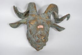 A good cast bronze / brass rams head mask of good size and form dating to the 20th century
