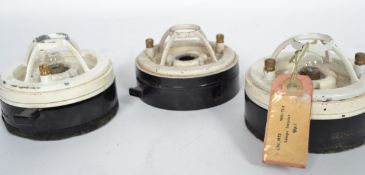A set of 3 Industrial mid century bulkhead factory lights of circular form, each with cage bulb